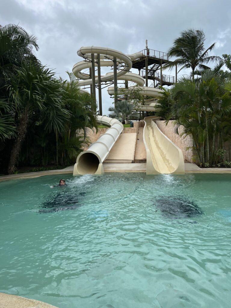 Pool slide at Dreams Playa Mujeres, all inclusvice resorts for families