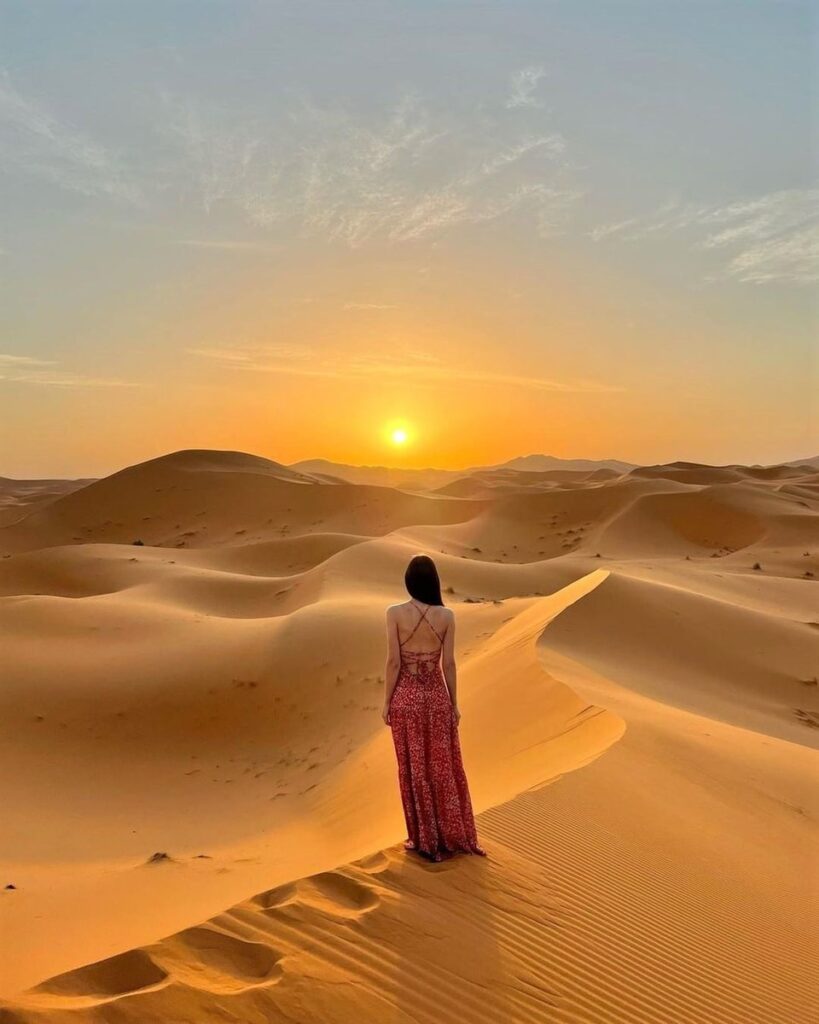 Sunset in the Sahara Desert. 