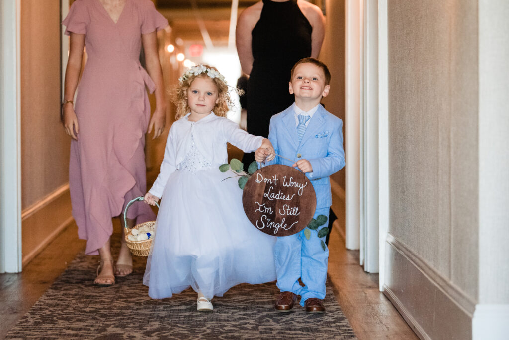 flower girl and ring bearer at a destination wedding. Should kids be invited to a destination wedding? In this case, my children were requested to come.