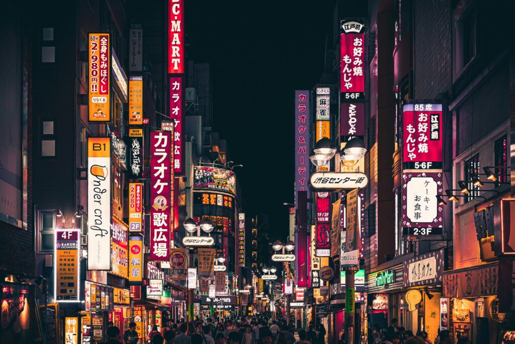 People walking in the street of Tokyo, Japan. Tokyo should be in everyone's perfect japan itinerary.